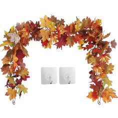 two pairs of earrings with autumn leaves on them