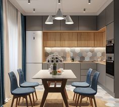 a dining room table with blue chairs in front of an oven and countertop area