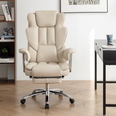 a white office chair sitting on top of a hard wood floor