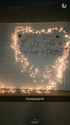 a heart shaped sign that says, will you light up my night at prom?