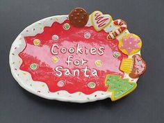 a plate with cookies for santa written on it