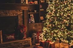 a living room with a christmas tree and presents