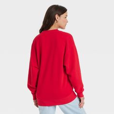 Refresh your cool-weather casualwear with this Leisure Studio Oversized Pullover Sweatshirt from Universal Thread™. Made from midweight cotton-blend fleece fabric, this solid-color sweatshirt is fashioned in an oversized silhouette for relaxed, laid-back vibes. It features a crew neckline, long sleeves with drop shoulders and a mid-length design, all trimmed with ribbed edges for neat styling. Leisure Studio: dress stylishly, live comfortably Universal Thread™: Found exclusively at Target. Color Sweatshirt, Basic Sweatshirt, Oversized Pullover, Oversized Silhouette, Womens Fleece, Universal Thread, Full Zip Hoodie, Fleece Fabric, Pullover Sweatshirt