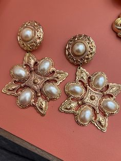 Fun vintage  80's clip on earrings  Gold with Pearl accent  Late 80's and early  90's style very light weight  Clip ons  They look very Versace and 80's soap opera style Versace 90s, Versace Earrings, 90s Jewelry, 80s Earrings, Vintage Versace, Vintage Pearl, Lazy Outfits, Vintage Pearls, Soap Opera