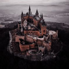 an aerial view of a castle in the middle of nowhere