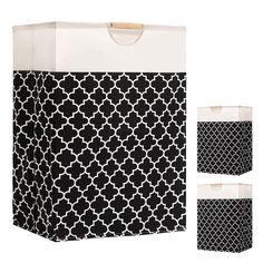 two black and white shopping bags with handles on each side, one in the shape of a trellis