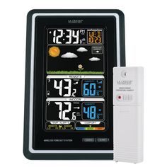 the weather station is set up with an alarm clock and temperature gauge, as well as a digital thermometer