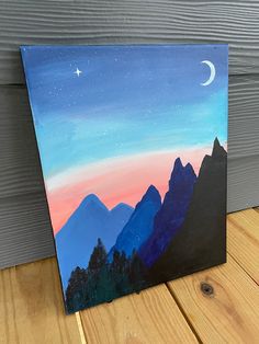 an acrylic painting of mountains at night