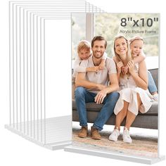 a set of 8x10 clear acrylic photo frames with an image of the family