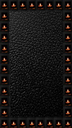 a black leather texture with orange lights in the corner and squares on the bottom side