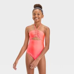 Brighten up your kid's swim looks with the Shining Bright Solid One-Piece Swimsuit from art class™. This bandeau-style swimsuit features a cutout at the front along with a cinches and a halter-neck design for a standout look. Made from soft and stretchy fabric with classic coverage, this sleeveless swimsuit offers comfort all through their water or seaside activities. Plus, with the UPF 50+ rated design it helps keep their skin shielded from sun rays. art class™: One-of-a-kind looks for the one Seaside Activities, Sleeveless Swimsuit, Big Peach, Scuba Diver Girls, Scuba Diver, Sun Rays, The Shining, Kids Swimming, Art Class