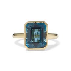 A vivid London blue topaz gemstone is the focal point of this eye-catching cocktail ring. Crafted in warm 14-karat yellow gold  it features lacy filigree along the profile view. London Blue Topaz Ring Yellow Gold, Gemstone Cocktail Rings, Yellow Topaz Ring, Topaz Cocktail Ring, True Autumn, Dream Rings, Blue Topaz Gemstone, London Blue Topaz Ring, Profile View