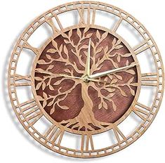 a wooden clock with a tree on it