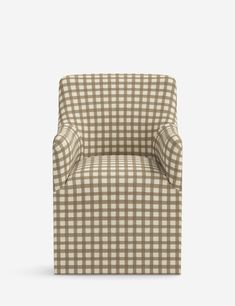 a brown and white checkered chair on a white background