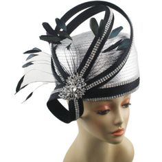 Introducing the Church Hat 8907, a delightful addition to any sophisticated wardrobe. This hat's striking black and silver palette is versatile and elegantly designed to complement a wide range of outfits and occasions. The centerpiece of the Church Hat 8907 is a stunning arrangement of black feather embellishments that add an air of opulence to the piece. Accompanying the feathers is a dazzling array of sparkling accents that capture the light beautifully, ensuring that you will stand out from White Church Dress, White Church Hats, Silver Palette, Church Skirts, First Lady Church Suits, Church Dresses For Women, Dresses Church, Women Church Suits, Women Church