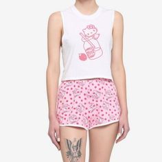 Hello Kitty Strawberry Milk Tank & Shorts Girls Lounge Set Hello Kitty Is Here To Keep You Cool And Refreshed! Relax With Sweet Style In This Adorable Lounge Set. It Includes A White Muscle Tank Featuring A Print Of Hello Kitty On Top Of A Bottle Of Strawberry Milk. The Matching Pink Shorts Feature An Allover Strawberry And Strawberry Milk Carton Print, And Come With An Elasticated Waistband For Comfort. Top: 100% Cotton Shorts: 95% Cotton; 5% Spandex Wash Cold; Dry Low Imported Listed In Junior Kawaii Cotton Sleepwear For Summer, Kawaii Cotton Summer Bottoms, Kawaii Cotton Bottoms For Summer, White Kawaii Summer Sleepwear, Kawaii Style Cotton Bottoms For Summer, White Kawaii Sleepwear For Summer, Playful White Sleeveless Sleepwear, White Short Top For Sleepover, Cute Short Tops For Sleepover