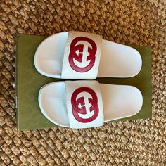 Brand New, Never Worn, Size U.S. 8 Mens, White And Red, Comes With Original Box, Tags, And Shoe Covers ***Could Be Worn As A Womens Size 9*** White Rubber Sole Slides For Summer, White Gucci Sandals For Summer, Designer Slip-on Sandals With Red Sole, Luxury White Gucci Sandals, Designer White Round Toe Sandals, White Gucci Sandals With Branded Insole, Gucci Flat Slides For Summer, White Gucci Open Toe Sandals, Gucci Casual Slip-on Slides