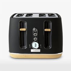 an image of a toaster that is black and gold