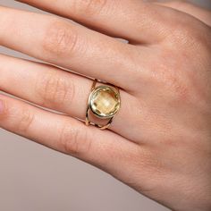 Lemon Quartz ring with double band in 14K solid gold. A modern and timeless stone ring with a natural quartz gemstone. A perfect gem gold ring for women, dainty and subtle that adds glam to every outfit. The best for her. 100% handcrafted with love! D E T A I L S ● Metal: 14K solid gold or 14K white gold or 14K rose gold ● Gemstone: Lemon Quartz, briolette cut ● Stone Diameter: 10mm (0.4in) or 12mm (0.5in) R I N G ∙ S I Z I N G For General Reference: ● we use standard US Ring Sizing ● an average Modern Gold Jewelry With Round Stone, Timeless Citrine Gemstone Jewelry, Modern White Gold Jewelry With Citrine, Modern White Gold Citrine Jewelry, Timeless Citrine Jewelry As Gift, Timeless Citrine Jewelry For Gift, Elegant Faceted Citrine Rings, Modern Open Ring Birthstone Ring With Gemstone, Modern Birthstone Ring With Open Ring Shape