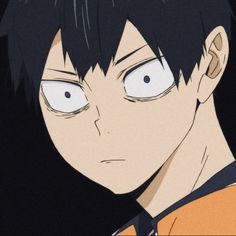 an anime character with black hair and blue eyes looks at the camera while staring into the distance