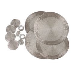 three plates and two silver rings on a white background