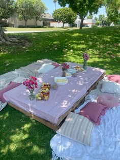 a picnic table set up in the grass