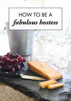 grapes, cheese and wine on a table with the words how to be a fabulous hostess