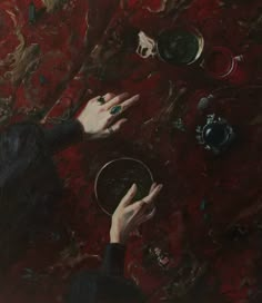 a painting of two hands reaching for something