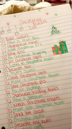 a handwritten christmas list is shown on a piece of lined paper with writing in it