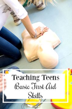 teaching teens basic first aid skills with the help of an adult and child at school