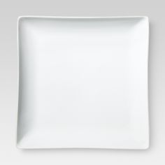 a white square plate on a gray background