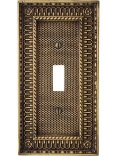 a decorative light switch cover with an intricate design