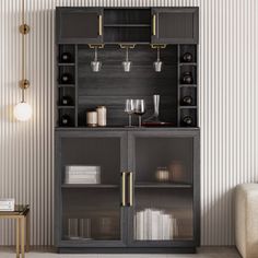 a black cabinet with glass doors and gold handles in the corner of a living room