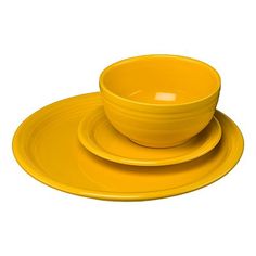 yellow dinnerware set on white background with clipping path to the plate and bowl