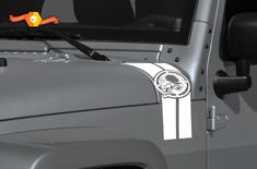 a jeep with a sticker on the side of it's door is shown