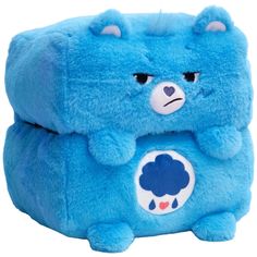 CARE BEARS: 10" MUSHMILLOWS CUBES - GRUMPY BEAR - Happy Nappers Care Bears Mushmillows Cubes bring to life a new world of collectible fun. Transform from a compact 10-inch cube to a spacious 5 x 10 x 20 inch pillow with ease. Perfect for versatile play and relaxation. Use your Mushmillow as a chair, pillow, footrest, or play mat. Ideal for various activities and adding comfort to any space. Colorful characters and compact cube design make a fun stackable plush toy to collect and share. Colorful Bear Personality, Happy Nappers, Tikes Toys, Grumpy Bear, Kids Climbing, Play Cube, Bear Character, Playful Decor, Cube Design