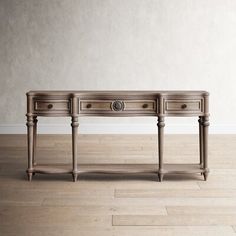 an antique console table with two drawers