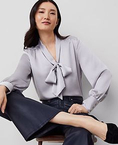 Our V-neck blouse is cinched with a tie neck for an irresistibly feminine twist. V-neck with ties. Long sleeves with button cuffs. Shirttail hem.,Imported:Imported,Fit:Classic: an easy, straight fit,Length:25 1/2" long,Fabrication:100% Polyester,Garment Care:Machine Washable Satin V-Neck Bow Blouse by Ann Taylor Size regular - XS Magnesium Women's V-Neck, Long, Sleeve, Blouse, Tops, 100%, Polyester, Machine, Washable Blouse With Neck Tie, V-neck Satin Blouse For Office, Classic Silk Blouse With Tie Neck, Classic Tie-neck Blouse For Parties, Elegant Semi-formal Tie Neck Blouse, Chic Satin Tie-neck Blouse, Satin Bow Blouse, Neck Bow, Blouse Tops