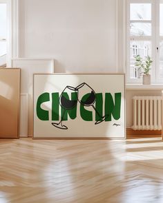 a poster with the word cion printed on it in front of a wooden floor