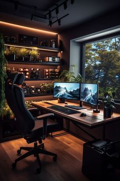 a computer desk with two monitors on it in front of a large window overlooking the mountains