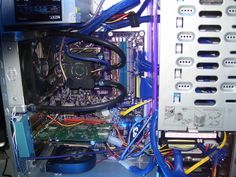 the inside of a computer with many wires