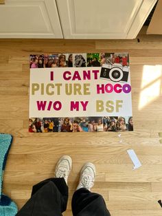 a person standing in front of a sign that says i can't picture hogo who my bsf