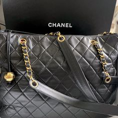 Authentic Vintage Chanel Lambskin Black Quilted Tote With Charm. Creasing In The Corners, Inside Is In Perfect Condition. No Wear On Handles Quilted Totes, Chanel Bags, Black Quilt, Vintage Chanel, Chanel Bag, Handles, Chanel, Bag Lady, Shoulder Bag