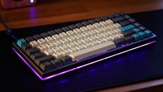 a computer keyboard sitting on top of a desk