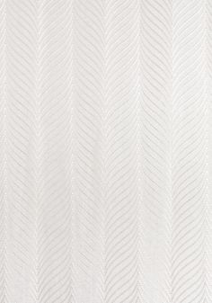 a white wallpaper with wavy lines on it