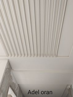 the underside of a ceiling with white paint on it