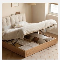 a bed that has been opened and is sitting on the floor