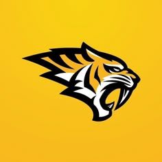 an image of a tiger head on a yellow background