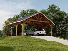 two cars are parked under a covered pavilion on the side of a hill with trees in the background