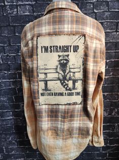 an old flannel shirt with the words i'm straight up not even having a good time on it